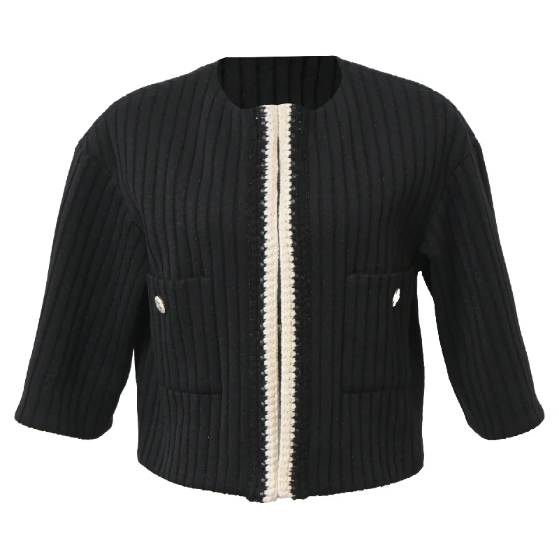 Chanel Cruise 2022 Knitted Collarless Jacket with Pockets in Black Polyamide